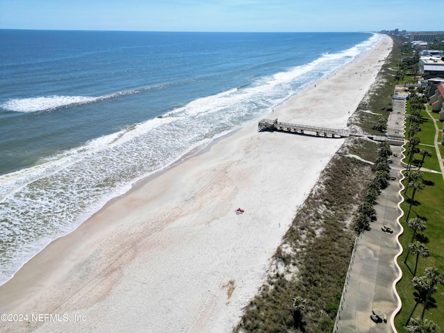 aerial view with a view of the beach and a water view