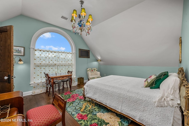 bedroom featuring lofted ceiling, a notable chandelier, and dark hardwood / wood-style floors