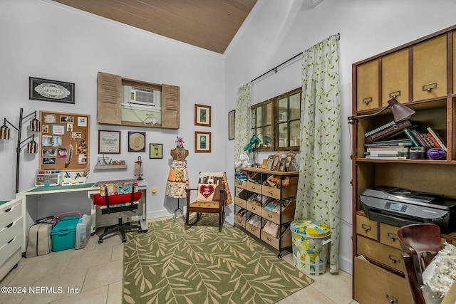 office space with light tile patterned floors and wooden ceiling