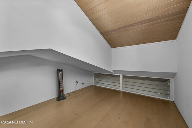 bonus room with hardwood / wood-style flooring, wood ceiling, and vaulted ceiling