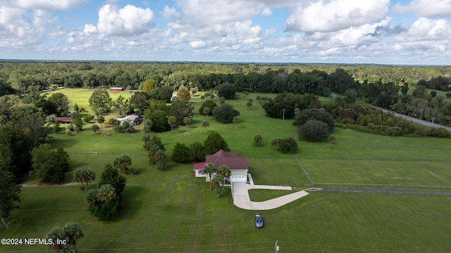 birds eye view of property with a rural view