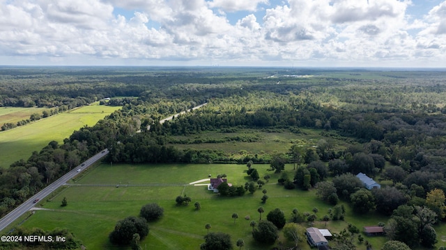 birds eye view of property featuring a rural view