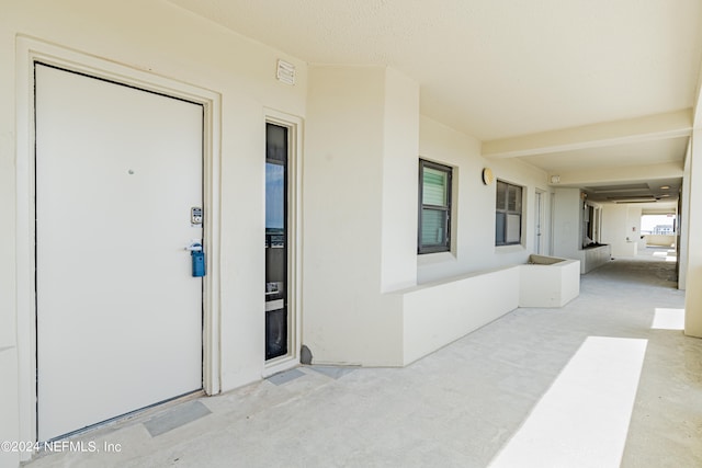 doorway to property featuring a patio