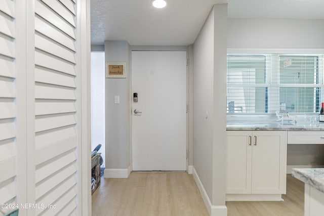 interior space with light hardwood / wood-style floors