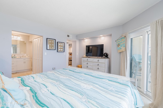 bedroom with ensuite bath