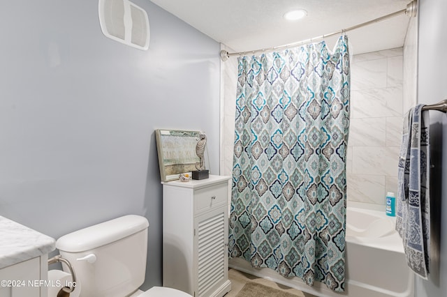 full bathroom with shower / bath combo, vanity, and toilet