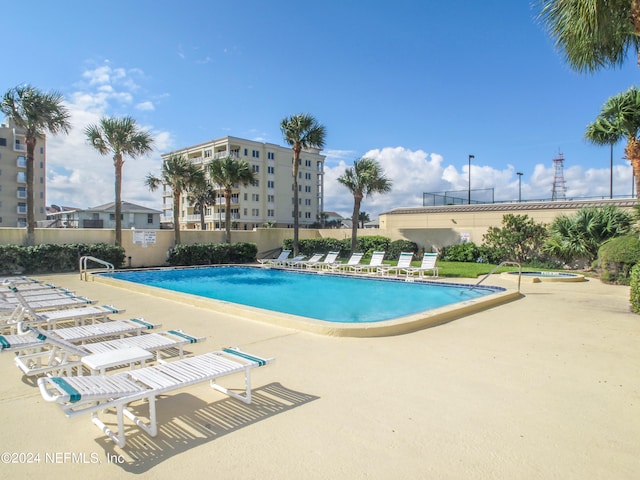 view of pool with a patio area