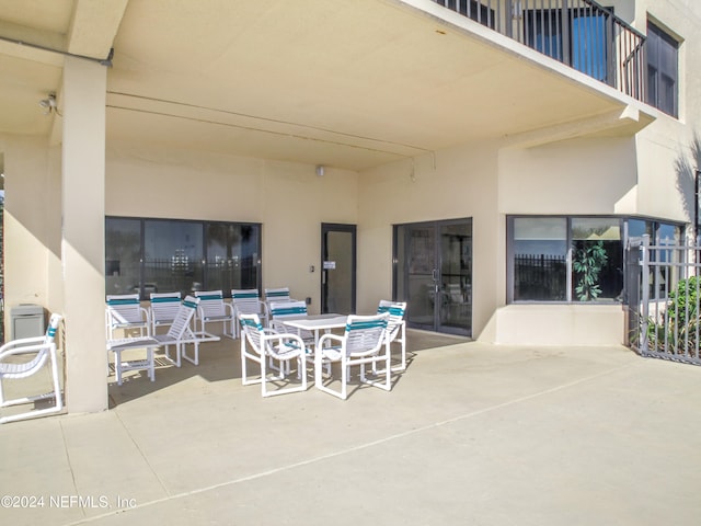 view of patio / terrace with a balcony