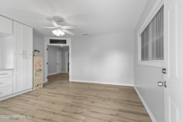 interior space featuring light hardwood / wood-style floors and ceiling fan