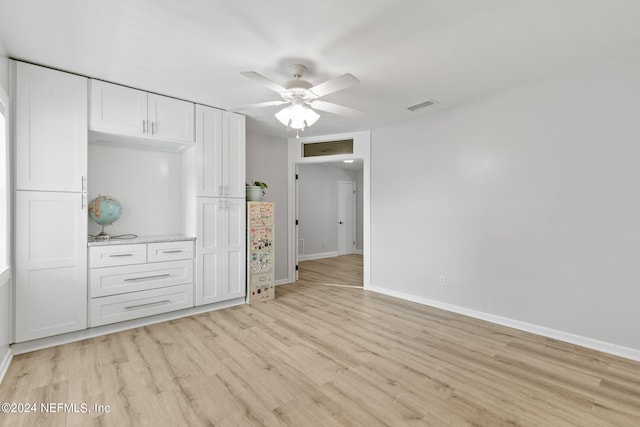 unfurnished bedroom featuring ceiling fan and light hardwood / wood-style flooring