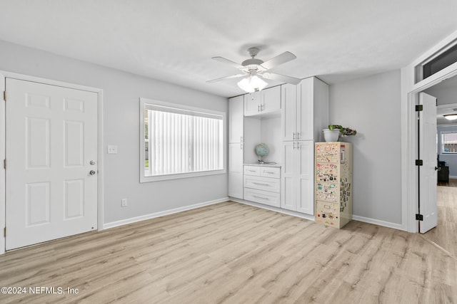 unfurnished bedroom featuring ceiling fan and light hardwood / wood-style flooring