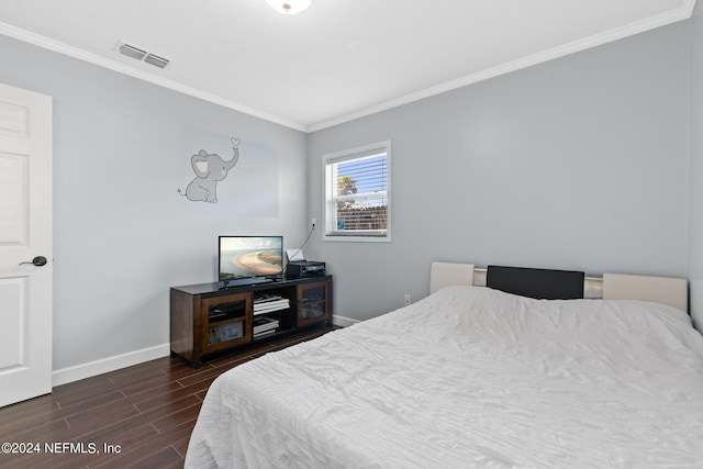 bedroom featuring ornamental molding and dark wood-type flooring