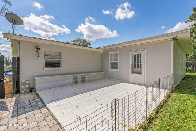 rear view of property with a patio area