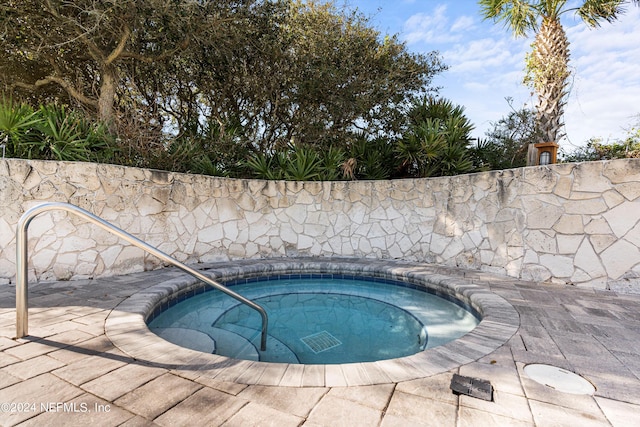 view of pool featuring a patio area