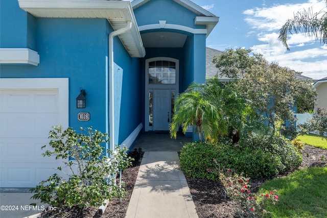 property entrance featuring a garage