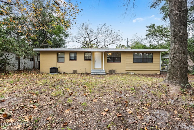 ranch-style home featuring central AC