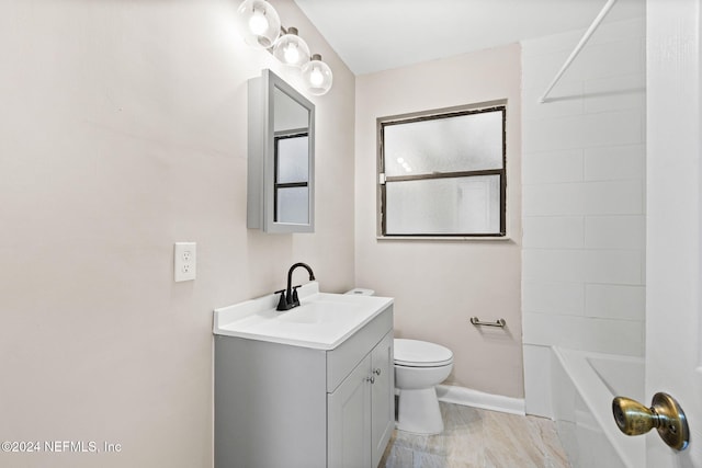 full bathroom featuring vanity, shower / bathtub combination, and toilet