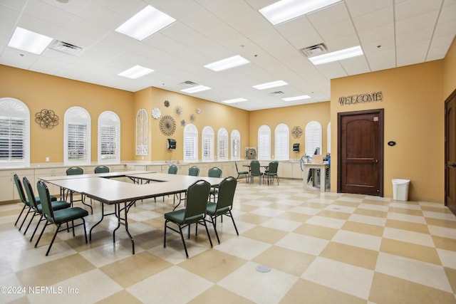8495 Little Swift Cir, Jacksonville, FL 32256 - dining room with visible vents and a paneled ceiling