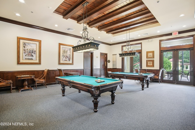 game room featuring wood walls, carpet flooring, and ornamental molding