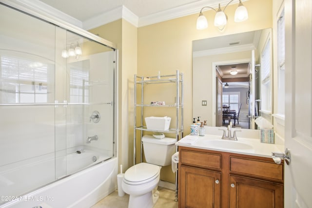 full bathroom with shower / bath combination with glass door, vanity, ornamental molding, tile patterned floors, and toilet