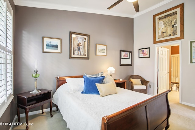 8495 Little Swift Cir, Jacksonville, FL 32256 - bedroom with light carpet, baseboards, ornamental molding, and a ceiling fan