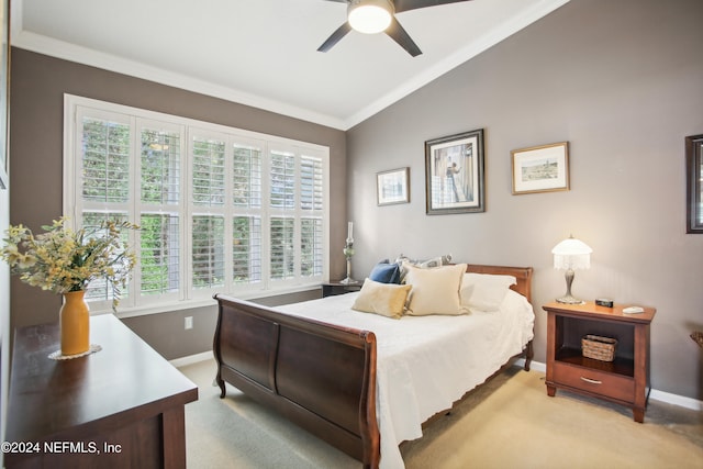 carpeted bedroom featuring multiple windows, crown molding, vaulted ceiling, and ceiling fan