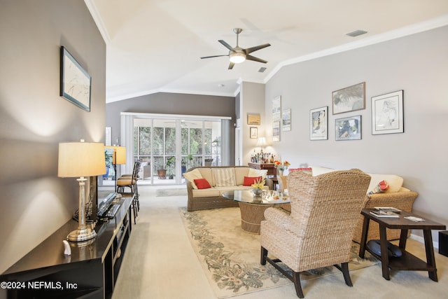 carpeted living room featuring lofted ceiling, ceiling fan, and crown molding