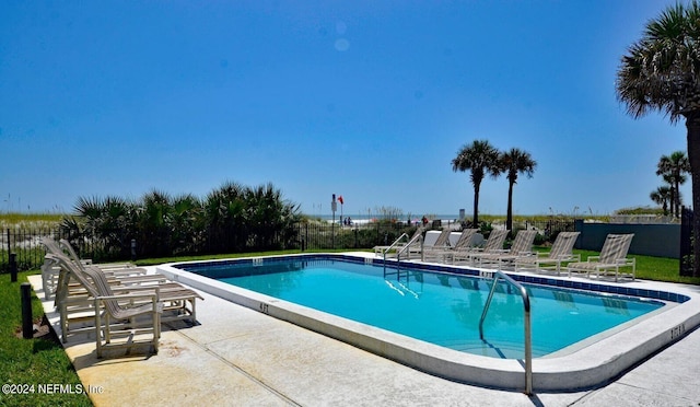 view of pool featuring a patio area