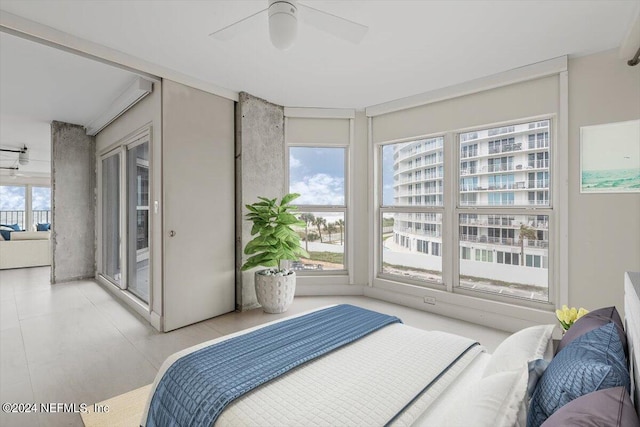 bedroom featuring ceiling fan