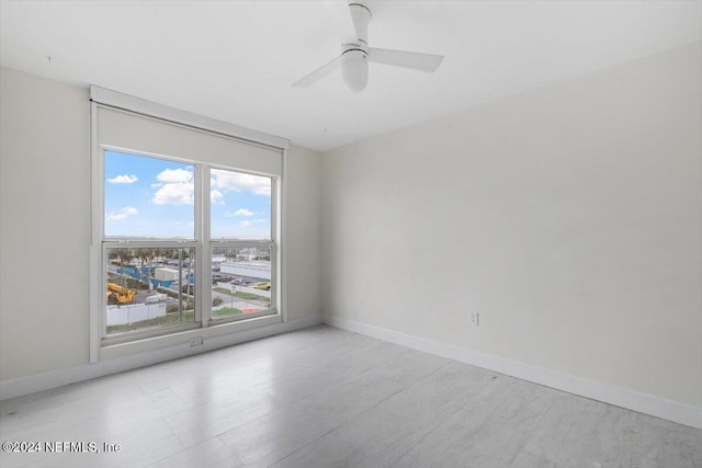 spare room featuring ceiling fan