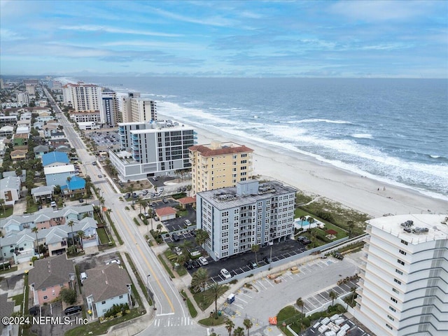 aerial view featuring a water view and a view of the beach