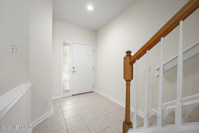 entrance foyer featuring light tile patterned floors