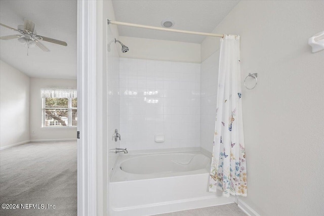 bathroom with shower / bathtub combination with curtain and ceiling fan