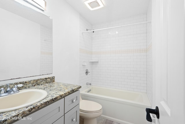 full bathroom with toilet, washtub / shower combination, and vanity