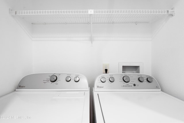 laundry room featuring washer and dryer and laundry area