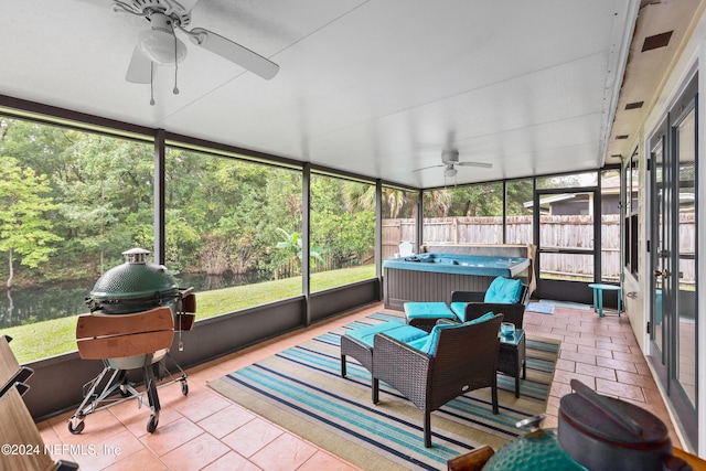 sunroom / solarium with ceiling fan