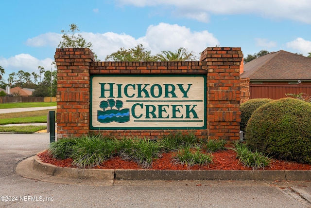 view of community sign