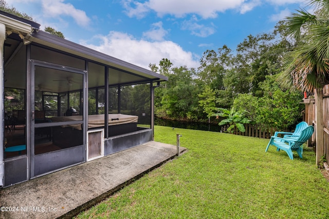 view of yard with a sunroom