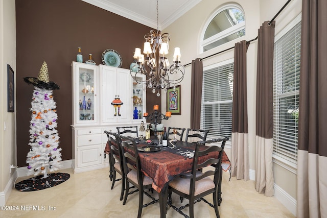 tiled dining space with an inviting chandelier, a towering ceiling, and ornamental molding