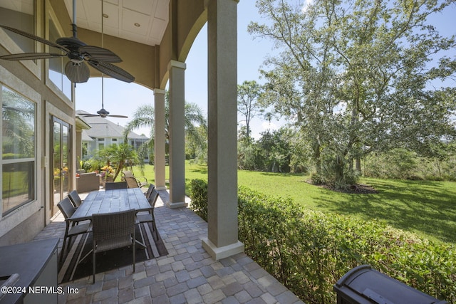 view of patio / terrace featuring ceiling fan