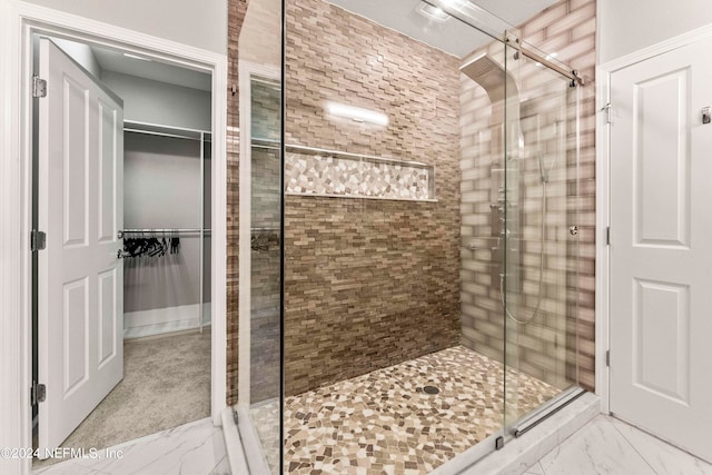 bathroom featuring an enclosed shower