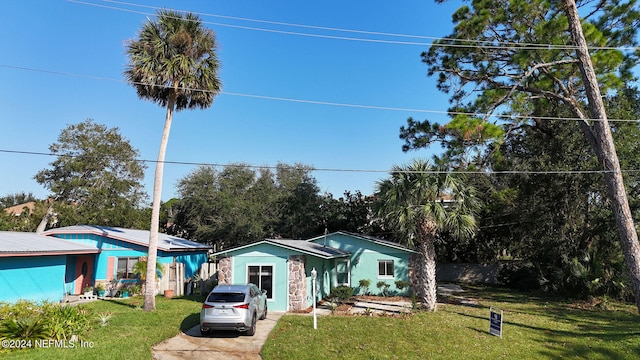 view of front of home with a front yard