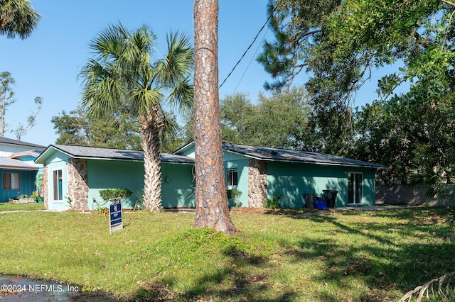 view of front of home with a front yard