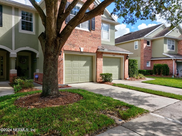 view of front of property featuring a garage