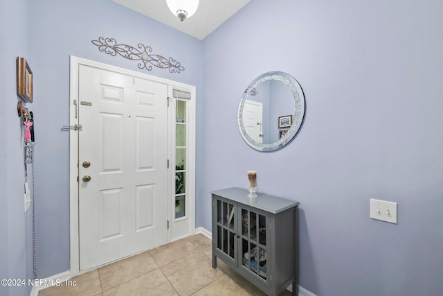 view of tiled foyer