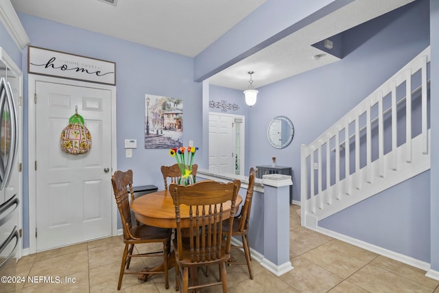 view of tiled dining space