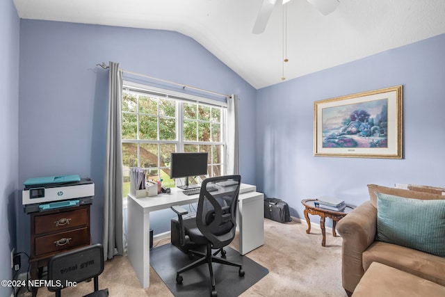 carpeted office with vaulted ceiling and ceiling fan