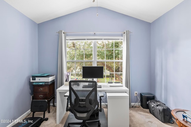 carpeted office with vaulted ceiling