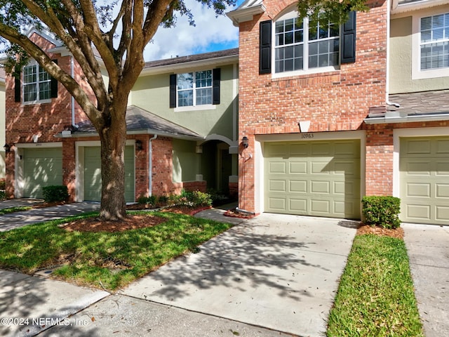 view of property featuring a garage