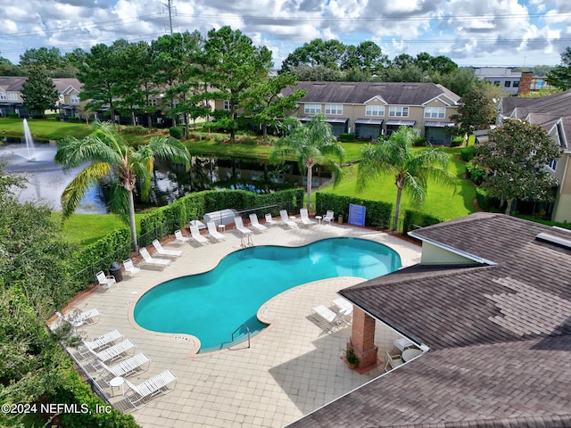 view of pool featuring a patio